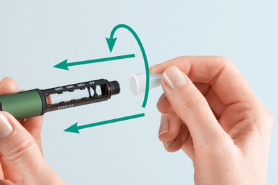 Needle handling - place the whole container with the needle inside onto your injection device